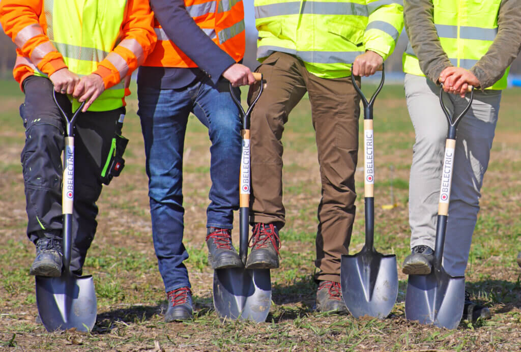 Four people during the groundbreaking of Eekerpolder