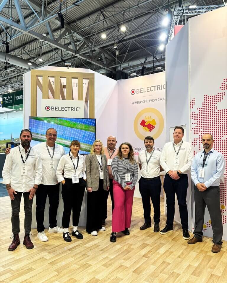 Staff in front of the exhibition stand